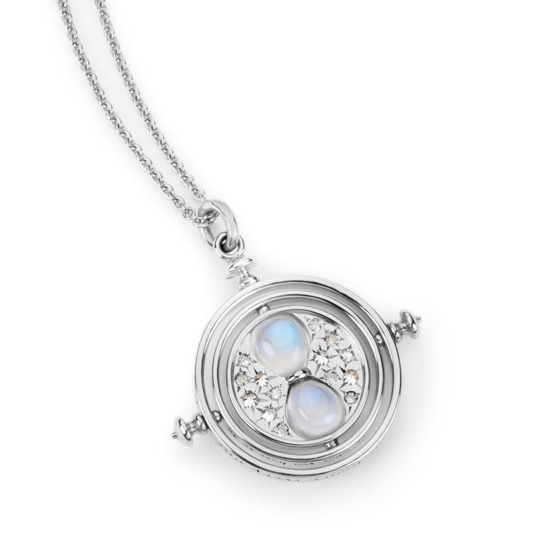 Fully spinning officially licensed Time Turner necklace made in platinum set with diamonds and moonstone by Freeman Jewelry. Also available in 14k yellow or white gold and 18k rose or yellow gold.