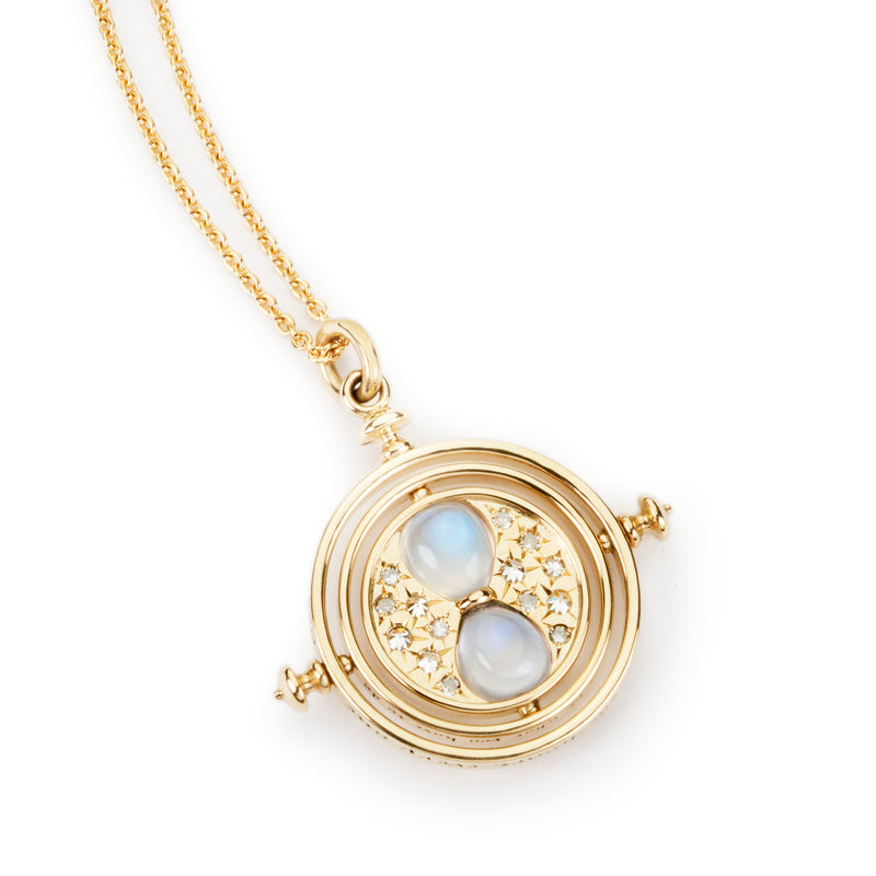 Fully spinning officially licensed Time Turner necklace made in 18k yellow gold set with diamonds and moonstone by Freeman Jewelry. Also available in 14k yellow or white gold, 18k rose gold, and platinum.