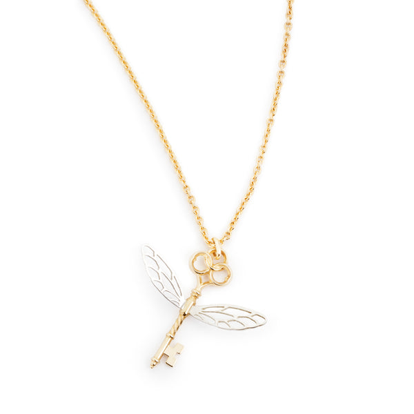 Officially licensed Harry Potter Winged Key pendant in solid 14k yellow gold with silver wings on a white background. Also available in sterling silver, 18k yellow gold, and platinum. 