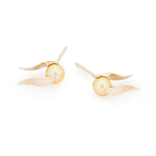Top view of officially Licensed Harry Potter Golden Pearl Snitch Earrings in solid 14k yellow gold on a white background. Also available in solid 18k yellow gold. 